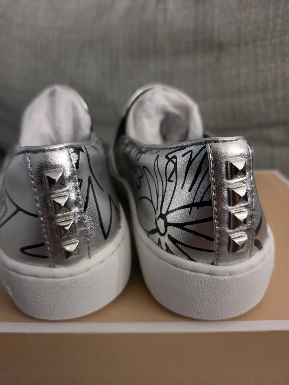 Michael Kors White Slip-On Sneakers with Black Graffiti